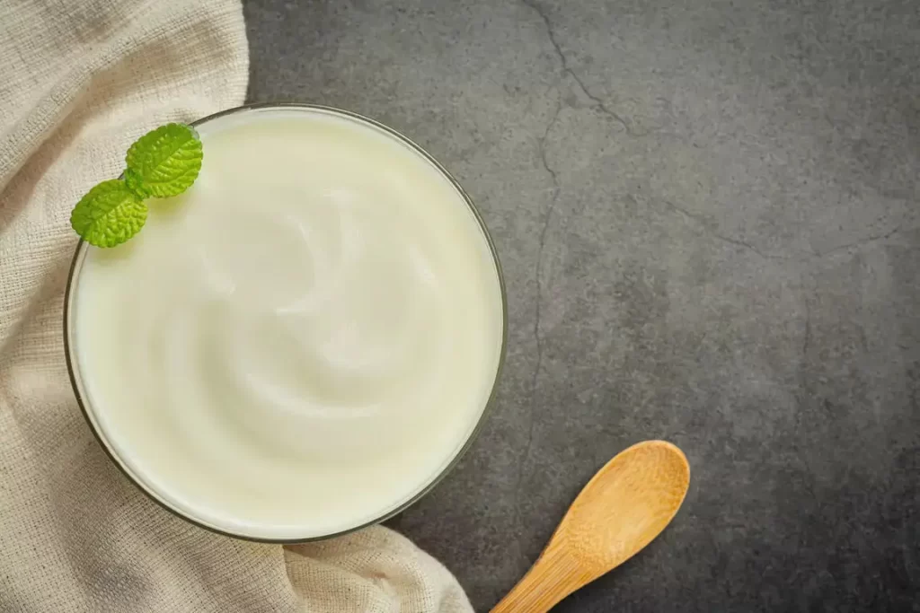 yogurt in a bowl with a spoon- Cream cheese recipe
