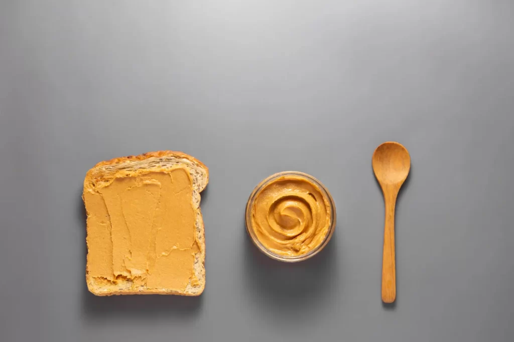 peanut butter bread and a bowl with a spoon-healthy peanut butter