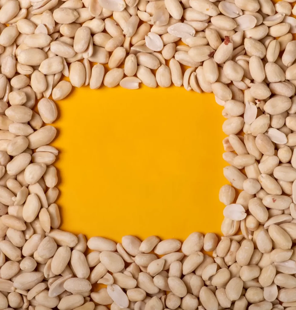 yellow background with peanuts on the edges-healthy peanut butter
