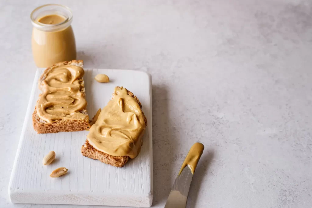 Peanut butter bread and shake on a table-high protein peanut butter for weight loss