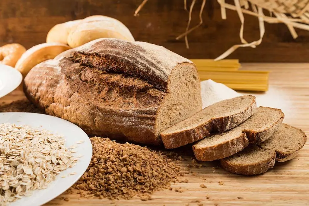 loaf of bread on a table - multigrain bread